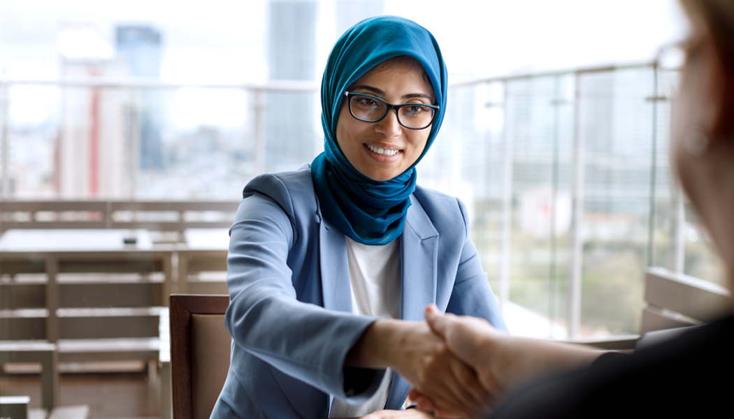 relationship manager smiling at branch customer